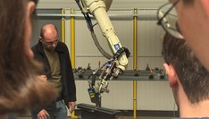 Robot OTC z siedmioma osiami